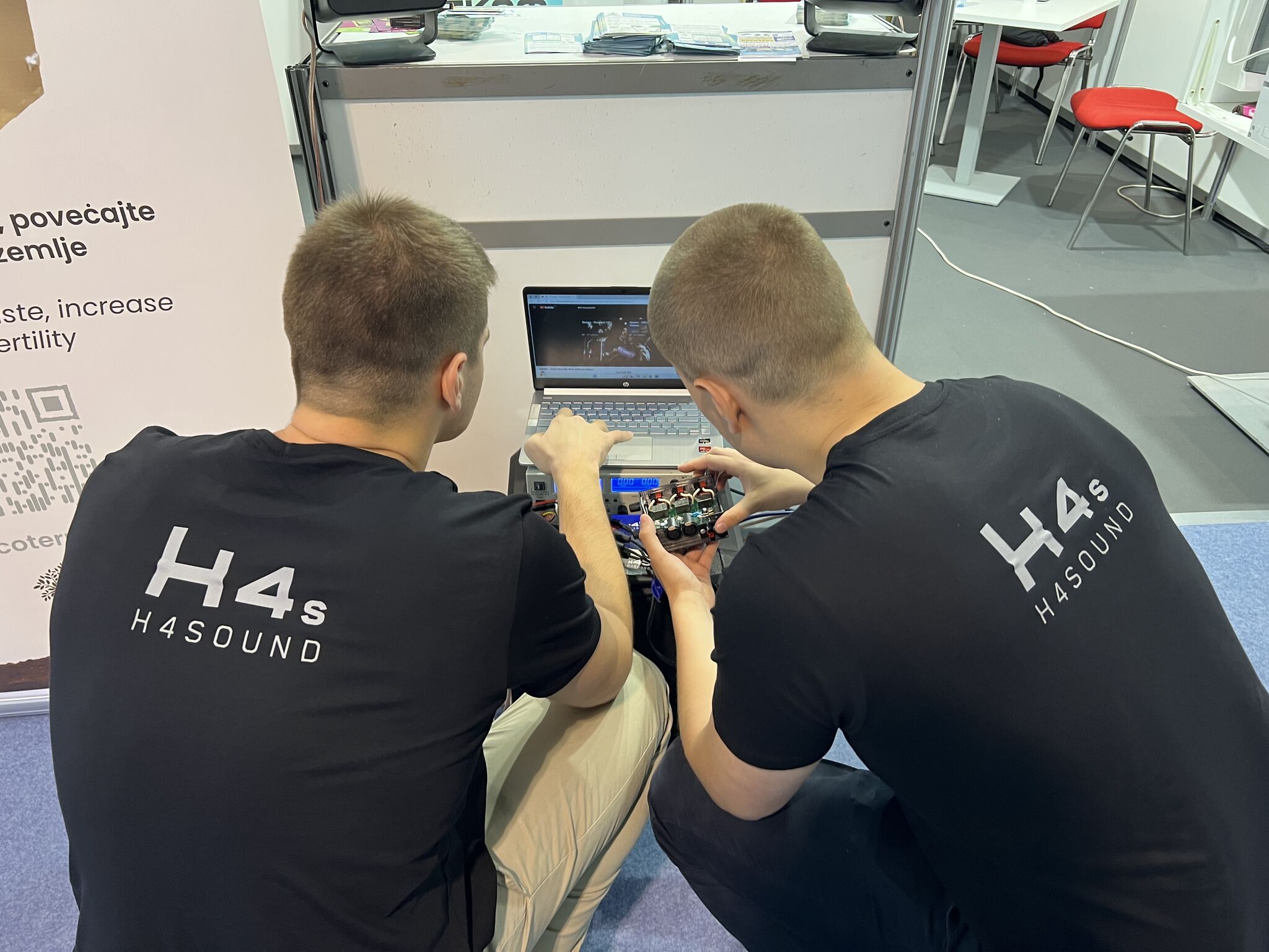 H4SOUND engineers working on amplifier hardware